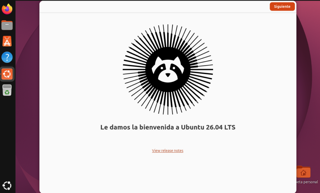 Pantallazo de Ubuntu 26.04. Se muestra la ventana de bienvenida de Ubuntu 26.04 LTS con el icono de un mapache.